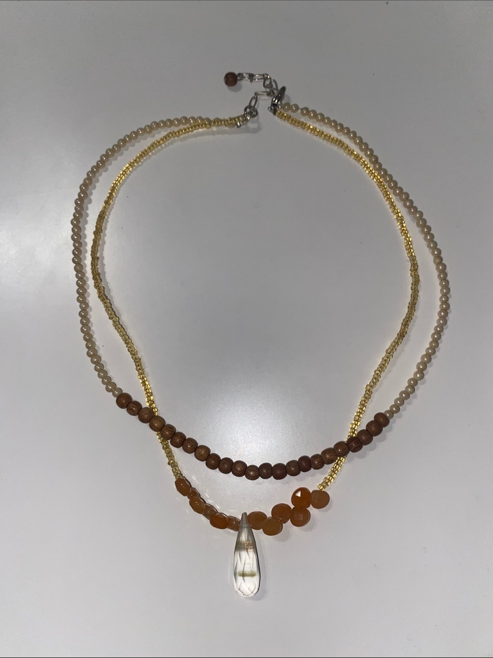 Layered Gold and Brown Beaded Necklace with Amber Accents